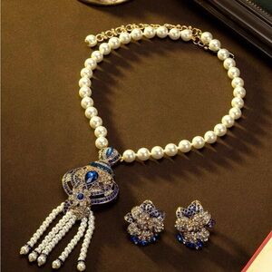 Elegant Pearl and Blue Gem Necklace by [Brand]